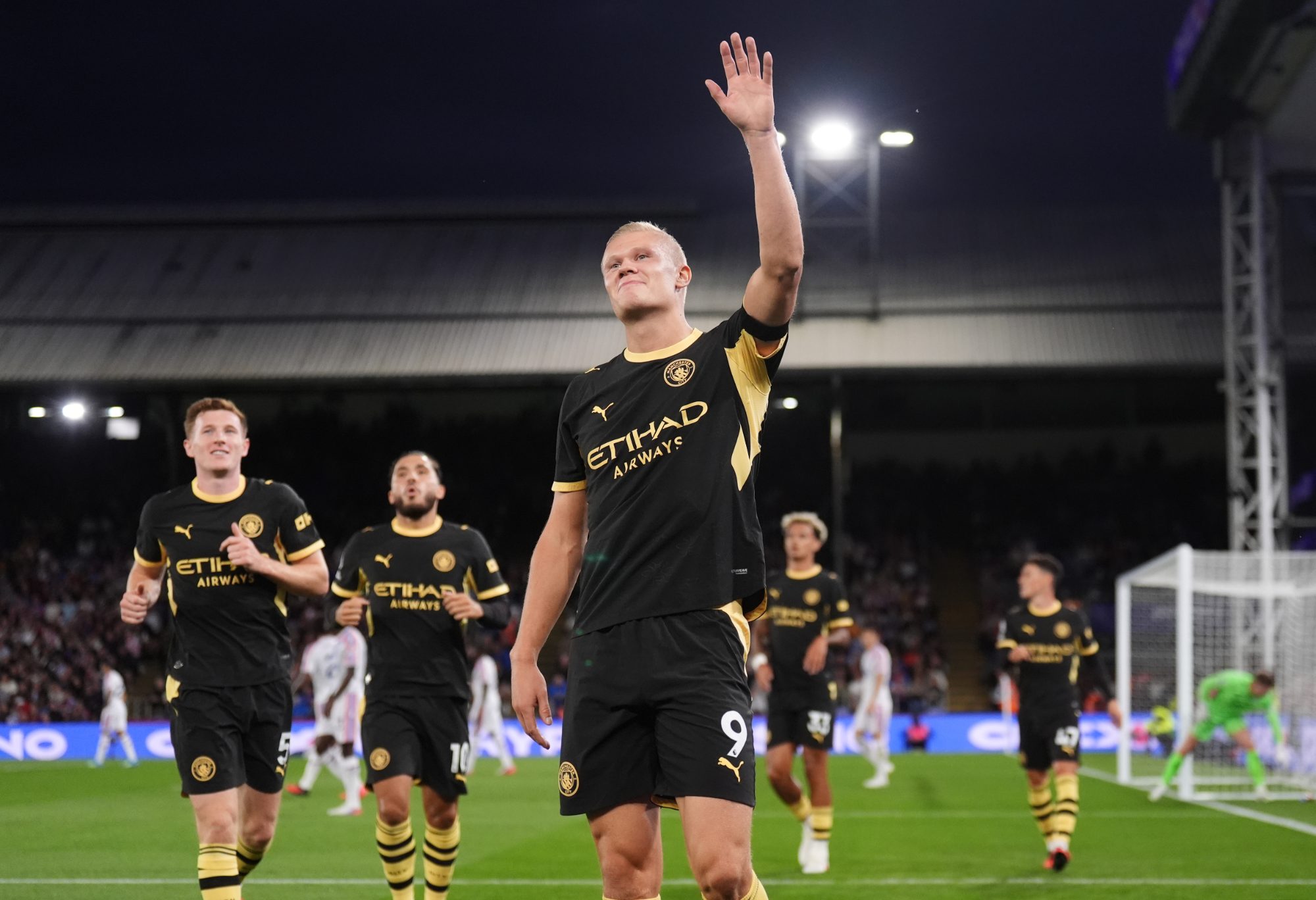 Erling Haaland celebrates after scoring for Manchester City
