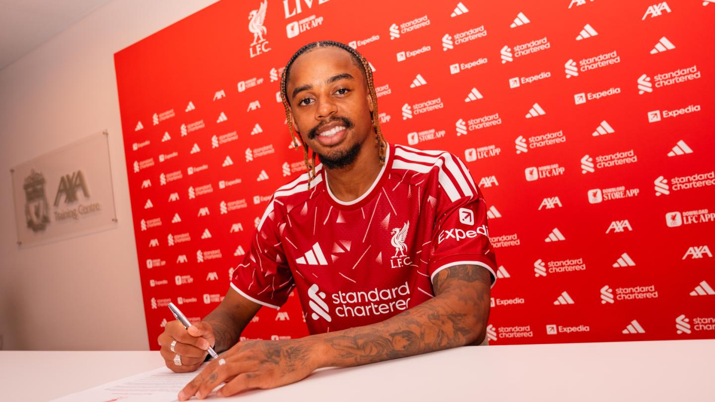 French winger Bradley Barcola signing his contract at the AXA Training Centre after completing his transfer to Liverpool.